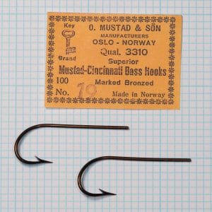 Mustad Quality 3310 — original packaging card and two hooks mounted — size 19 — orange kraft paper with Key Brand logo and letterpress text