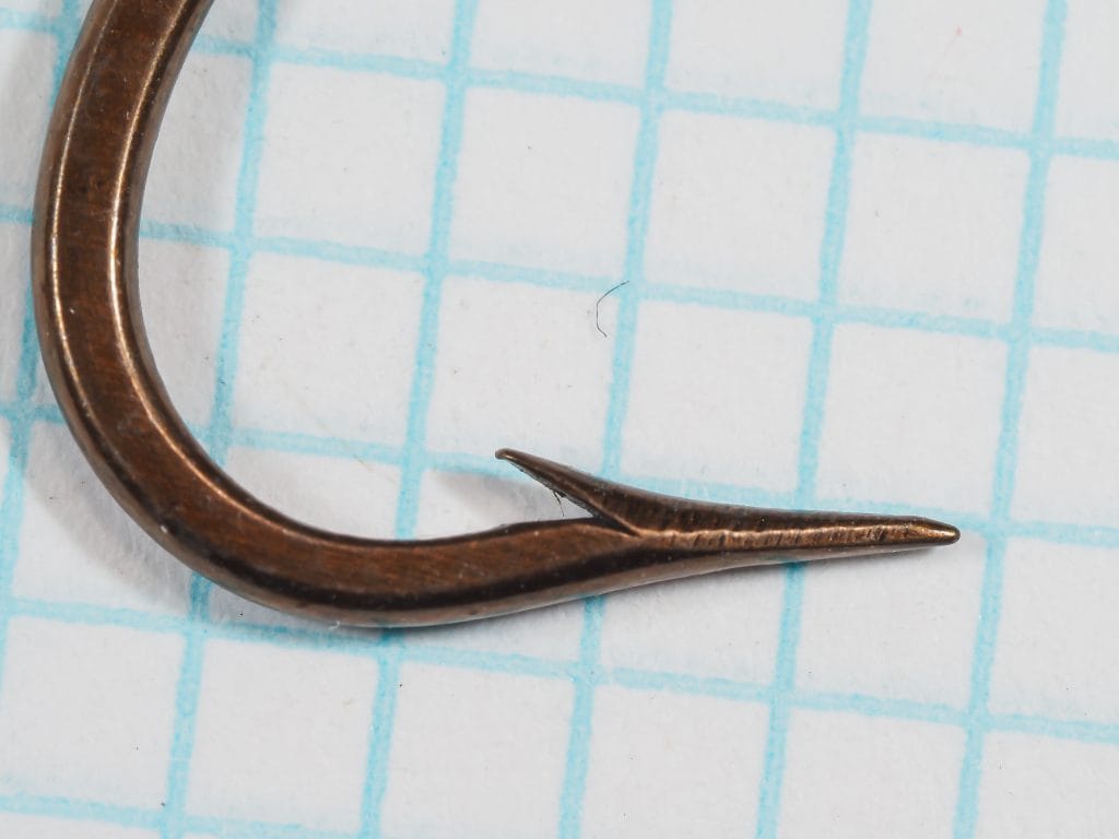 Harrison Bartleet 2989 — single hook enlarged view, point and tapered shank detail, bronzed finish