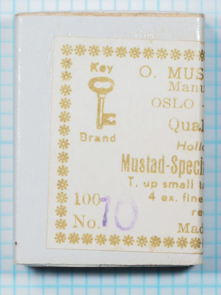 Mustad Quality 38933 Key Brand box marked size 10, with Oslo, Hollow Point, Sproat, and 4 ex. fine wire label text.