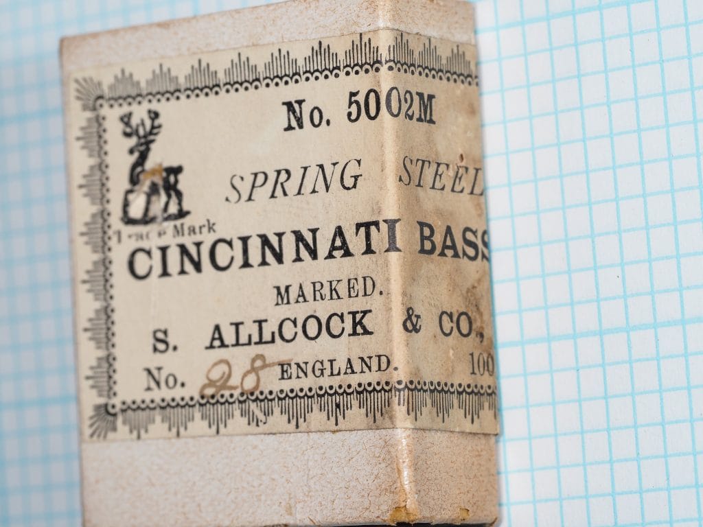 S. Allcock & Co. 5002M Cincinnati Bass Hook — maker's box label, size 28, polished steel, letterpress printing on cream kraft stock