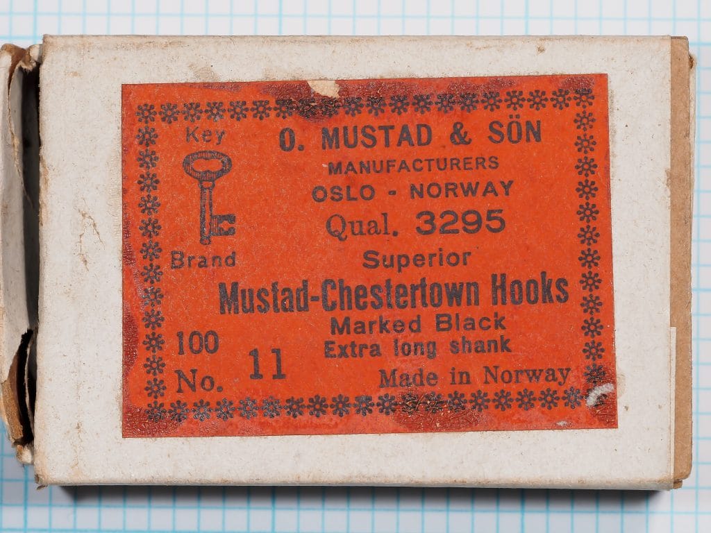 Mustad 3295 Chestertown Hook Box — original red label showing manufacturer and specifications — size No. 11 — vintage mid-20th century packaging