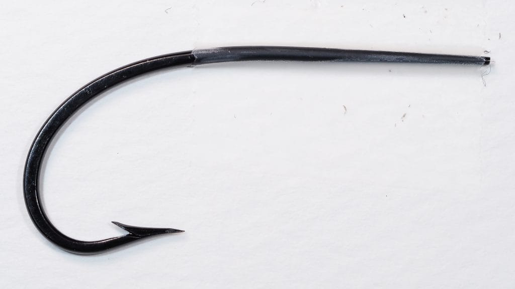 Milward 2867 O'Shaughnessy — full hook profile — size 2/0 — showing bend, shank, and blind eye