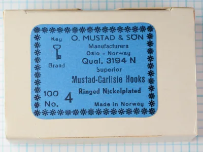 Mustad 3194 N — blue Key Brand packaging label on cream cardboard — size 4 — vintage Oslo Norway marking