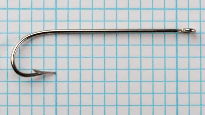 Mustad 3194 N — full profile view showing Carlisle proportions — size 4 — extra long shank design