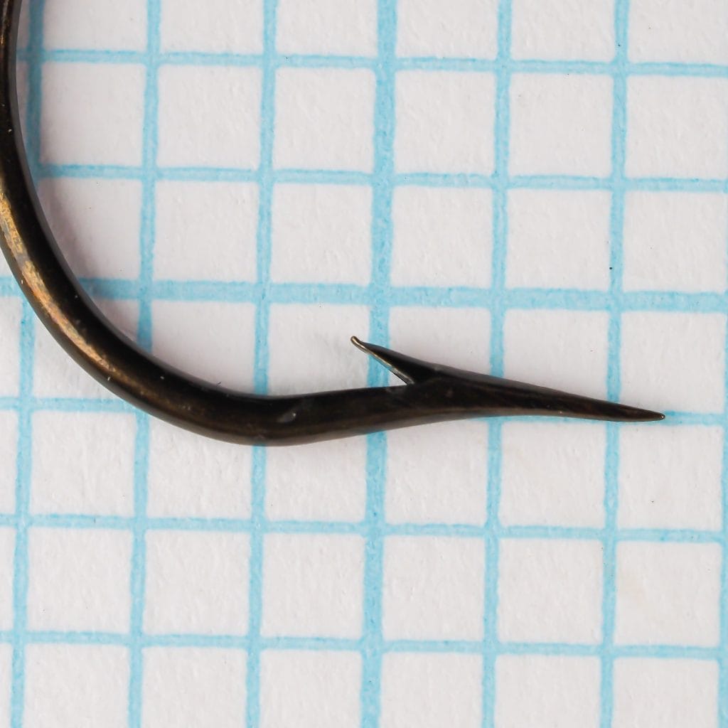 Mustad 3278 Aberdeen — point detail showing superior point geometry — size 5/0 — bronzed finish