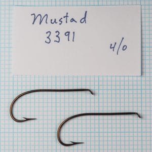 Two Mustad 3391 Sproat hooks, size 4/0, bronzed, with handwritten label identification.