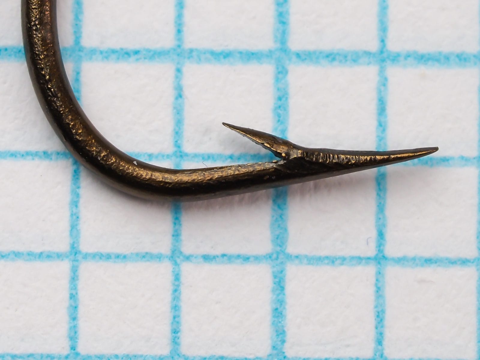 Mustad 3926 Kinsey Hook — close-up of hook point and barb geometry — size 14 — showing concave hollow-point cut and sharp barb