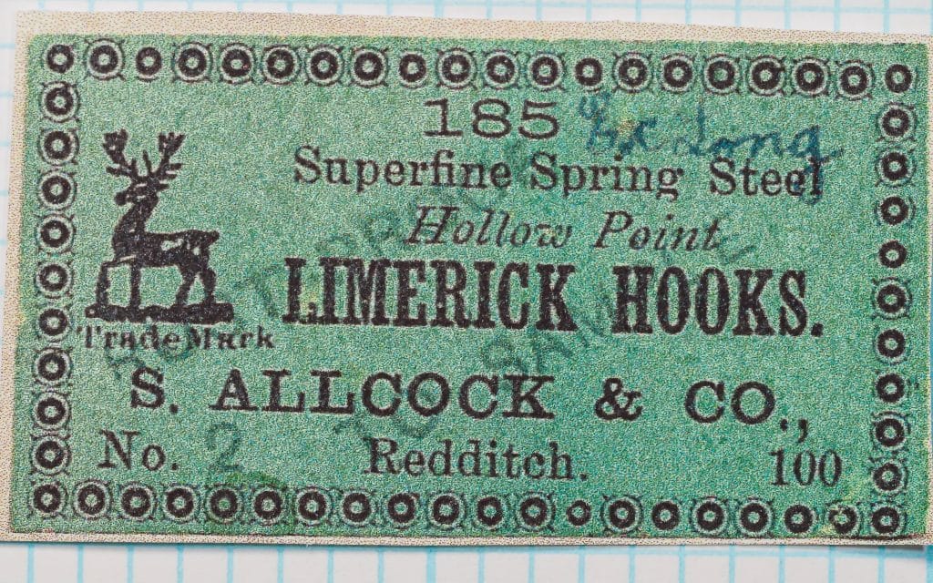S Allcock 185 Limerick Hook — green paper card label showing detailed text, size notation, and Allcock branding