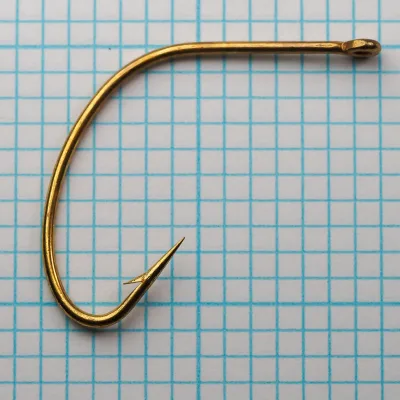 Herters No. 189 Hook shank and eye detail — showing ringed eye and bend curve — size 1/0 — gold plated