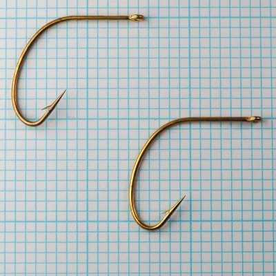 Herters No. 189 Hooks pair — comparative view of bend and eye construction — size 1/0 — gold plated