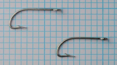 Mustad 3103 — two hooks showing overall profile — size 4 — Limerick bend and straight ring eye