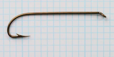 Mustad 3665A — complete hook profile — size 4 — showing tapered eye, shank, bend, and point on measurement grid