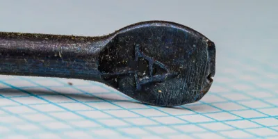 Samuel Allcock 198 Flatted Eye Size 2 — close-up of hook eye and shank section — showing distinctive blind-flatted spade-end and blue-grey finish