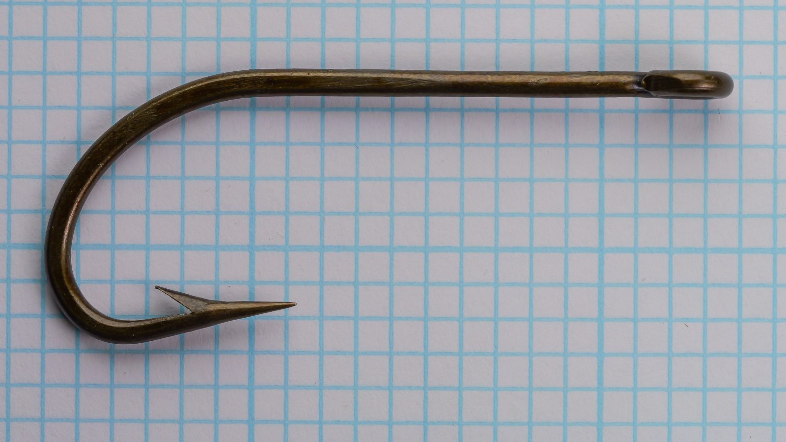 Horrocks-Ibbotson No. 169 O'Shaughnessy — full hook profile viewed from bend side — size 5/0 — O'Shaughnessy bend geometry with straight-ring eye