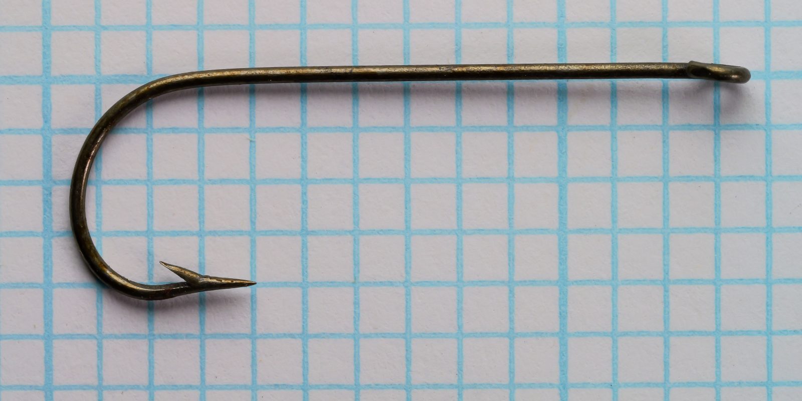 Horrocks-Ibbotson No. 465 Aberdeen hook, full body profile, demonstrates straight shank and reversed point.