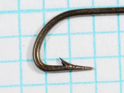 Alfred Willis and Sons Pennell Hook — Close-up of point and barb profile — Size 10 — Bronzed finish with superior point geometry