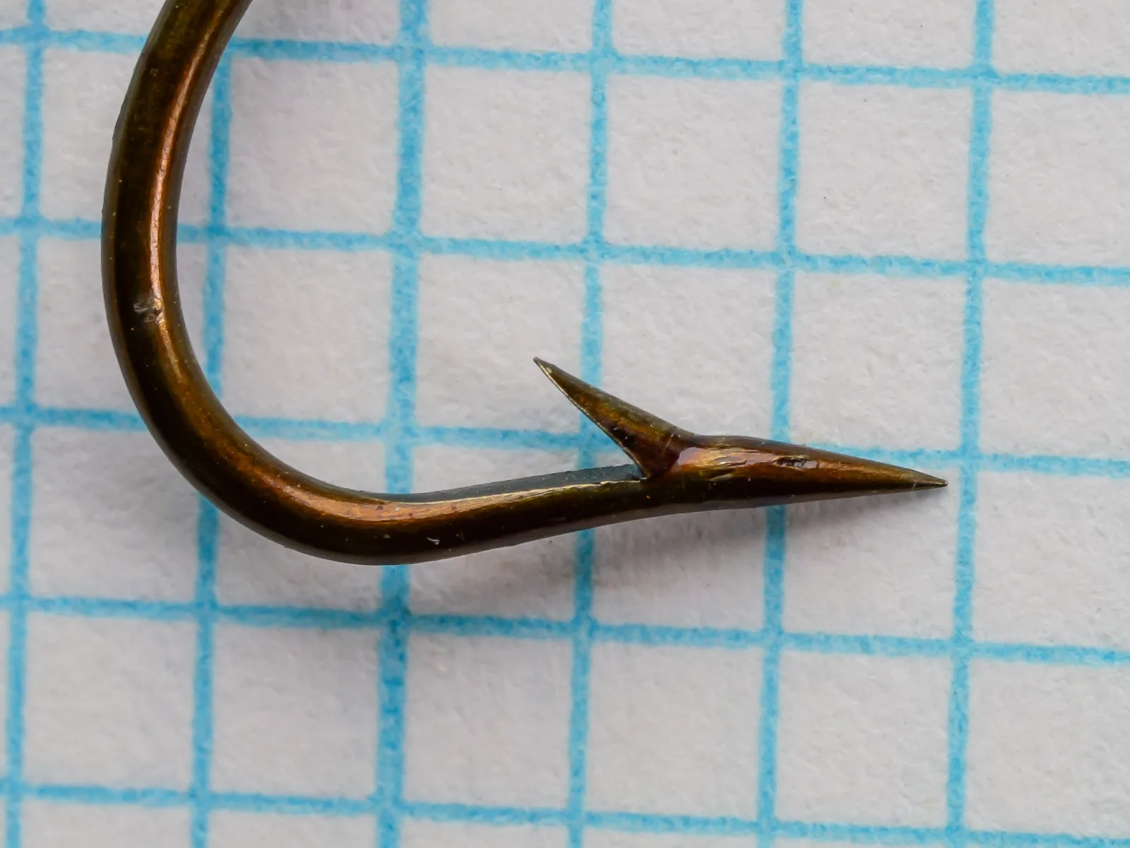 Horrocks-Ibbotson Grade 552 — side profile of hook point showing hollow point geometry — size No. 1 — bronzed finish with patina