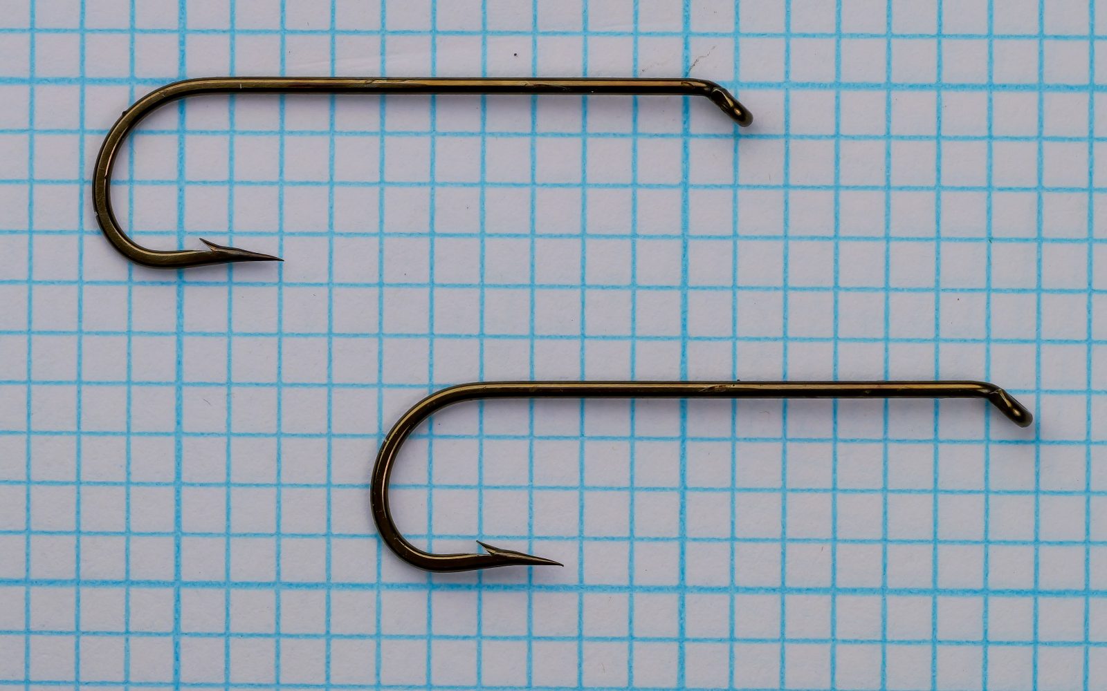 Joe Roope Jr. Signature Longshank — two hooks shown on measurement grid, full profile — size 4 — bronzed finish with turned-down eye