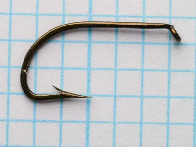 Mustad 17050 Crystal Hook — single hook profile view — size 7 — bronzed finish and superior point