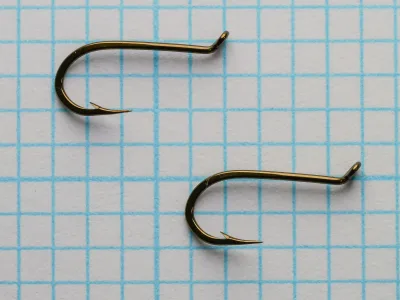 Mustad 19698 Hooks Comparative View — two hooks showing manufacturing consistency — size 12 — forged wire detail visible
