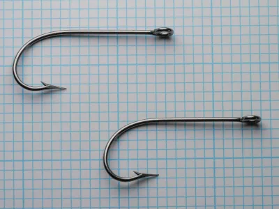 Mustad 3306 size 18 hooks comparison — two specimens — ringed eye and bright finish consistency