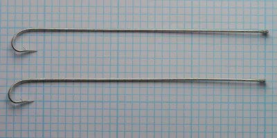Mustad 3576D Bridgeport Snapper — full hook profile and shank length comparison — Size 5 — two specimens on 1/10-inch grid, straight ringed eye visible