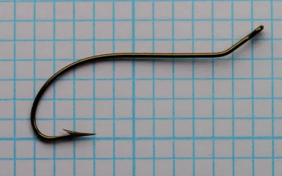 Mustad 3777 Central Draught — full hook profile on measurement grid — size 3/0 — showing complete bend geometry and ringed eye