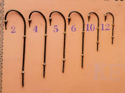 Mustad 3801 Sales Card — size range display — various sizes 2 through 12 — hooks mounted on card