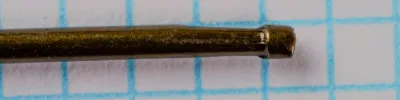 Mustad Quality 3828 — close-up of knobbed shank end — size 3/0 — detail showing flattened terminus and rigging surface