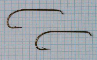 Mustad 3906B size No. 1 — pair of hooks from original card — side-by-side comparison — showing consistency and symmetry — on measurement grid