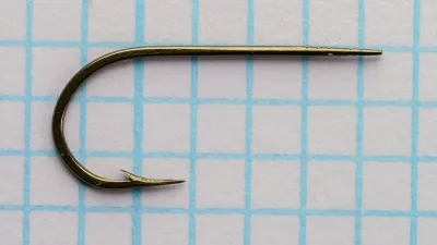 Mustad 57592 Viking Hooks — hook profile showing bend, shank, and blind tapered eye — size No. 9 — bronzed finish, full-length view on measurement grid
