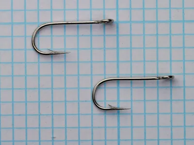 Mustad 7925 — two hooks at actual size — size 10 — showing scale and nickelplated finish
