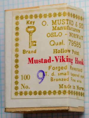 Mustad 79585 size 9 hook — full box face showing complete label layout and packaging condition — original gold-leaf printing on cream cardboard