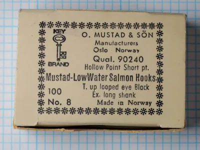 Mustad 90240 Low Water Salmon Hook — original cream-colored sales card with Key Brand logo and snowflake border, showing complete eight-line label, size No. 8