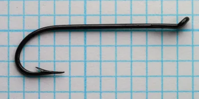 Mustad 9049 — full hook profile — looped eye detail — Limerick bend — size 6 — japanned black