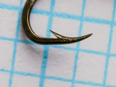 Mustad 92209 — Close-up of point and barb detail — Size 10 — showing hollow point concavity and barb angle