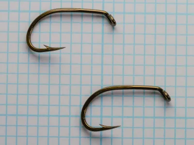 Mustad 9557 Hooks — two specimens side by side for comparison — size No. 4 — identical pattern and finish