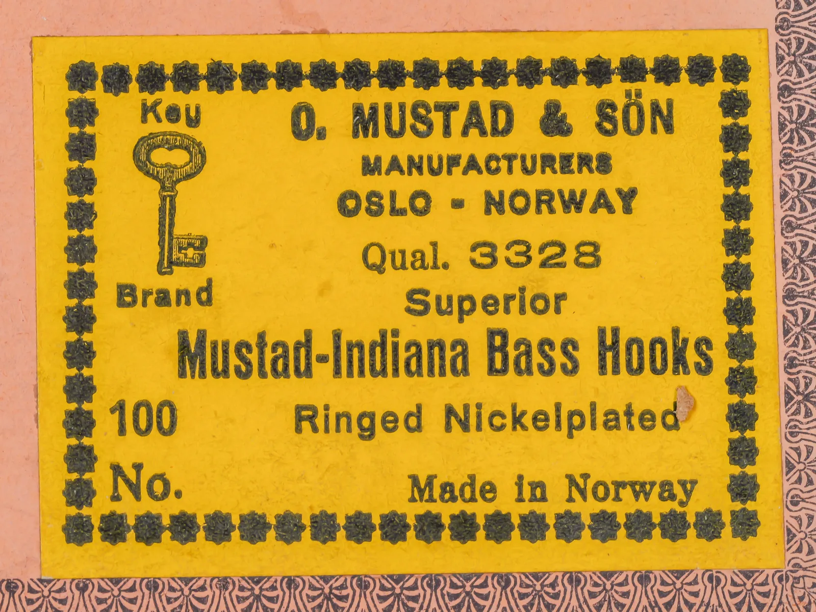 Mustad 3328 Superior Mustad-Indiana Bass Hooks — yellow salesman card label showing product specifications and Key Brand logo