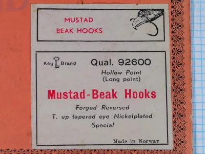 Mustad 92600 Beak Hooks sales card label — packaging text and Key Brand trademark — product specifications visible