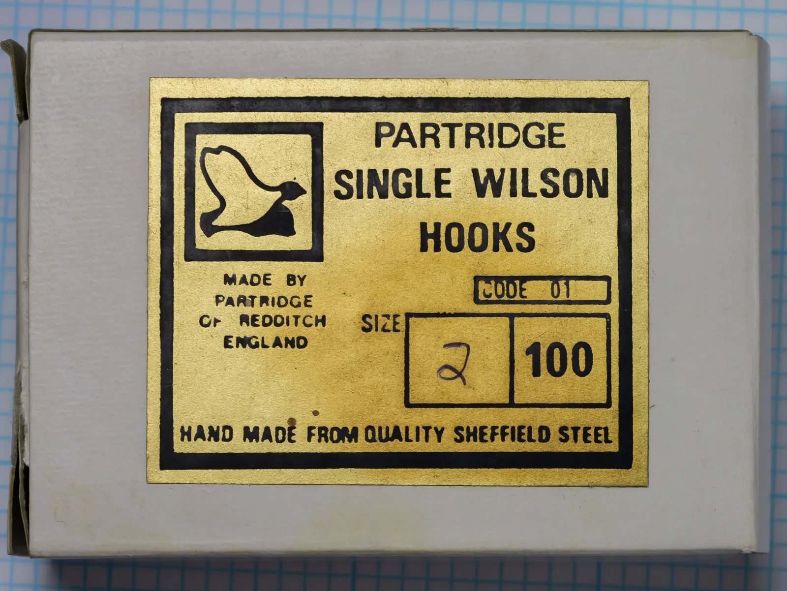 Partridge 01 Single Wilson — original yellow-card packaging — size No. 2, quantity 100 — Redditch-era marked packet front