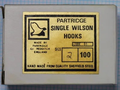 Partridge 01 Single Wilson — original yellow-card packaging — size No. 2, quantity 100 — Redditch-era marked packet front