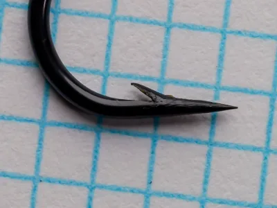 Partridge 01 Single Wilson size 2 — point detail — macro view showing spear point geometry and barb