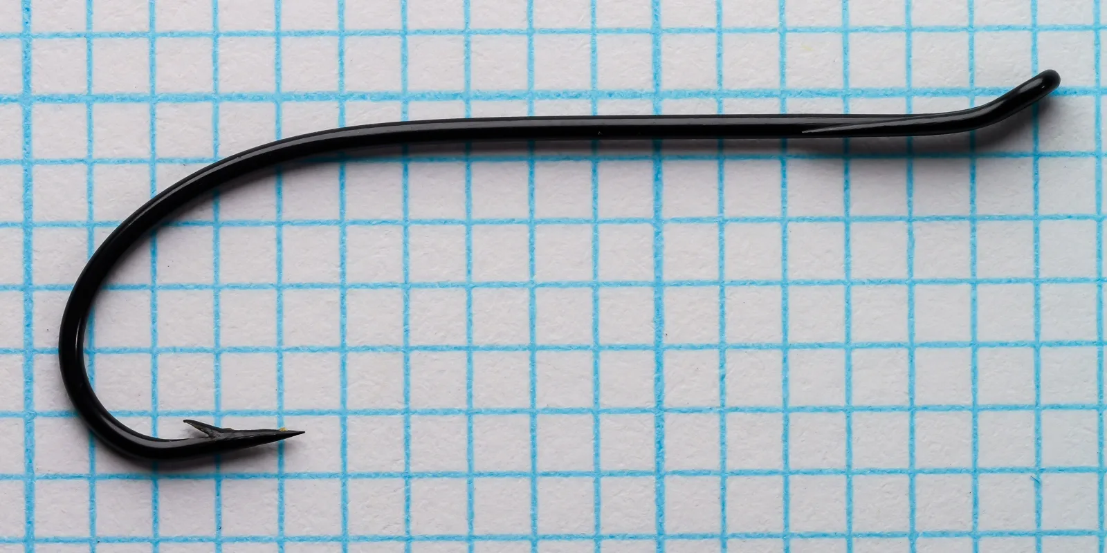 Partridge Single Wilson size 2 hook in side view on grid paper.