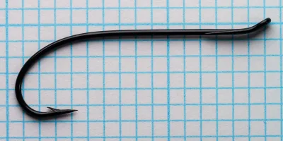 Partridge Single Wilson size 2 hook in side view on grid paper.