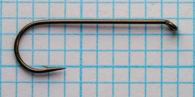 Partridge H1A size 6 hook pair — two hooks side-by-side showing consistency of bend and point — measurement grid