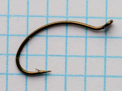 Partridge K2B Hook — full side profile showing turned-up tapered eye, bend, and overall proportions on measurement grid
