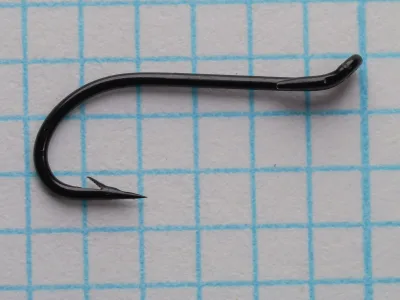 Two blued single salmon hooks displayed vertically on grid background