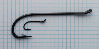 Vintage instruction card for Partridge salmon hooks with specifications and hook illustrations