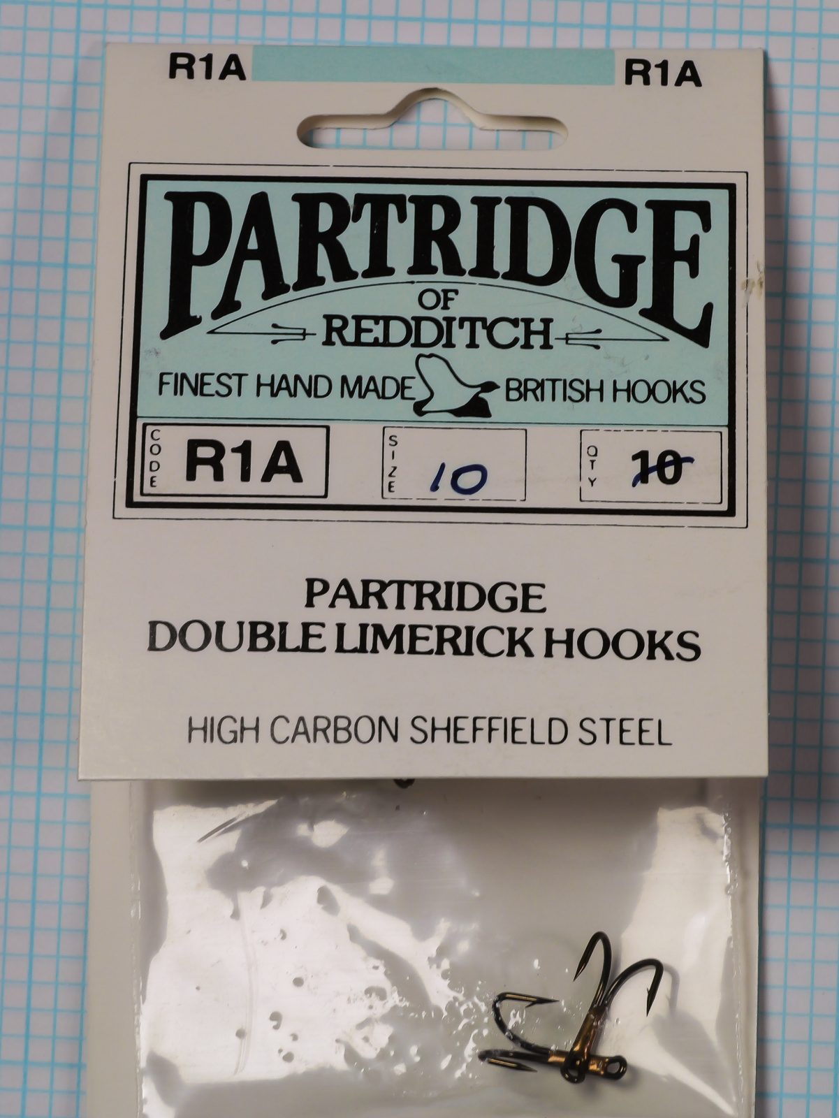 Partridge R1A packaging front — complete card with header label and hook specification boxes — size 10