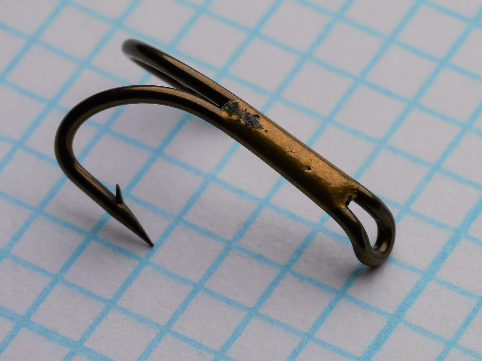 Partridge R1A Double Limerick — side profile showing bend and eye construction — size 10 — bronzed finish on measurement grid